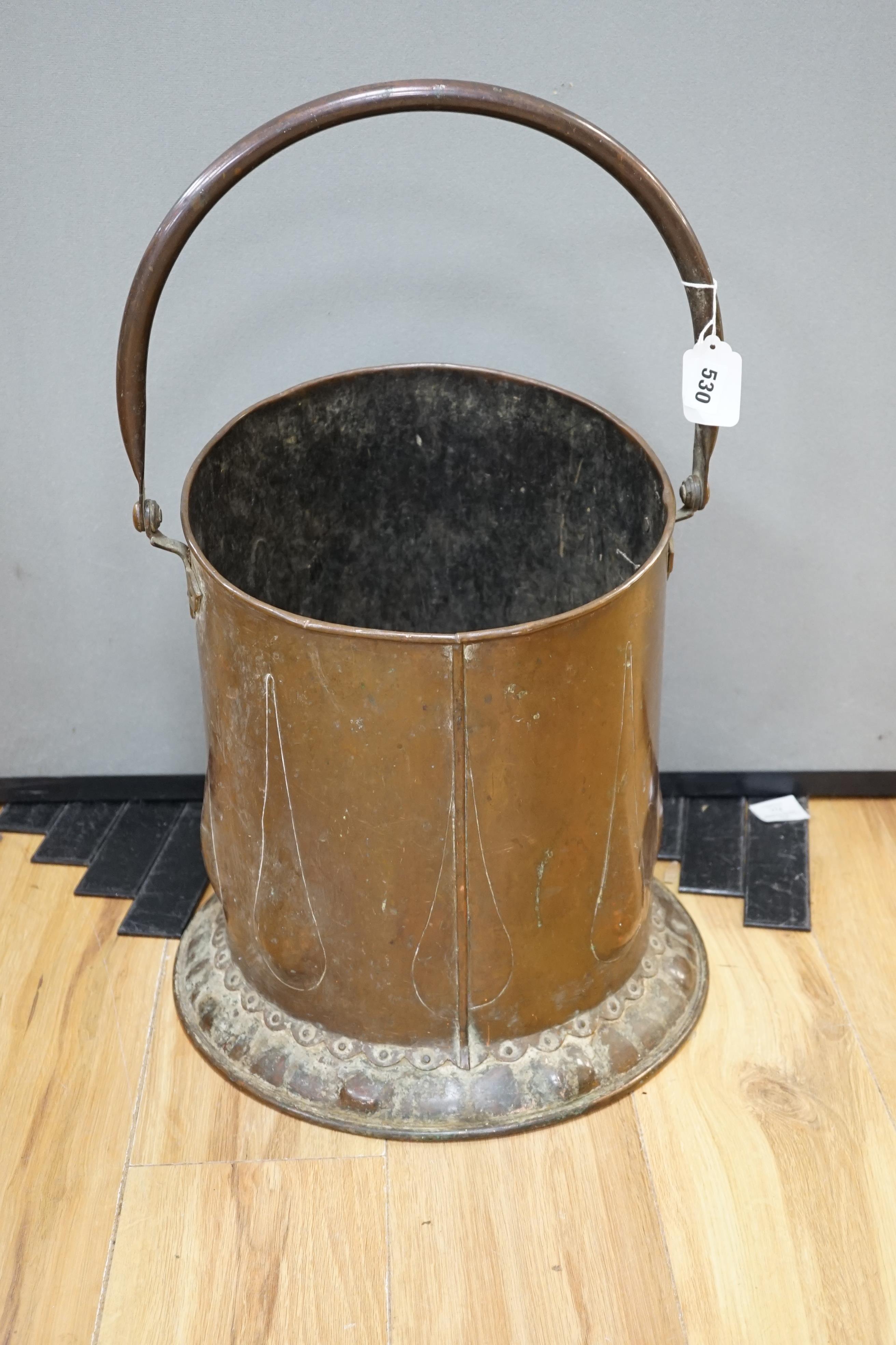 An Arts and Crafts copper coal scuttle, c.1900, 40cm